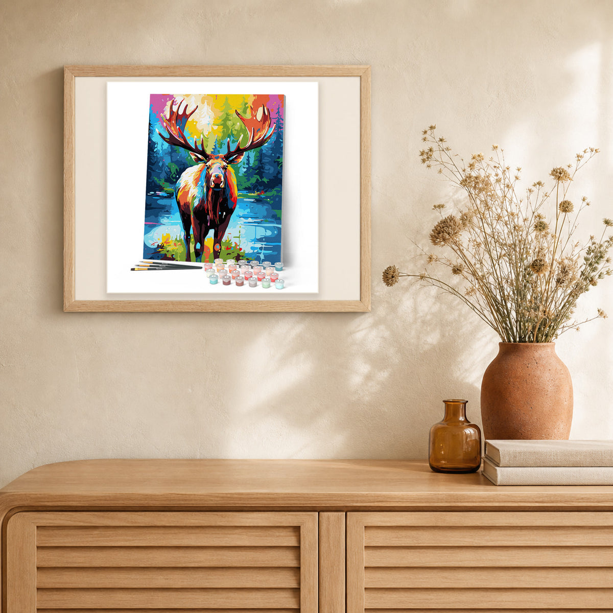 Colorful Abstract Moose artwork displayed in a warm interior