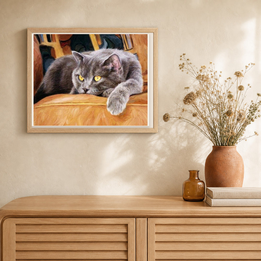 Cat on a Couch artwork displayed in a warm interior