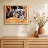 Cat on a Couch artwork displayed in a warm interior