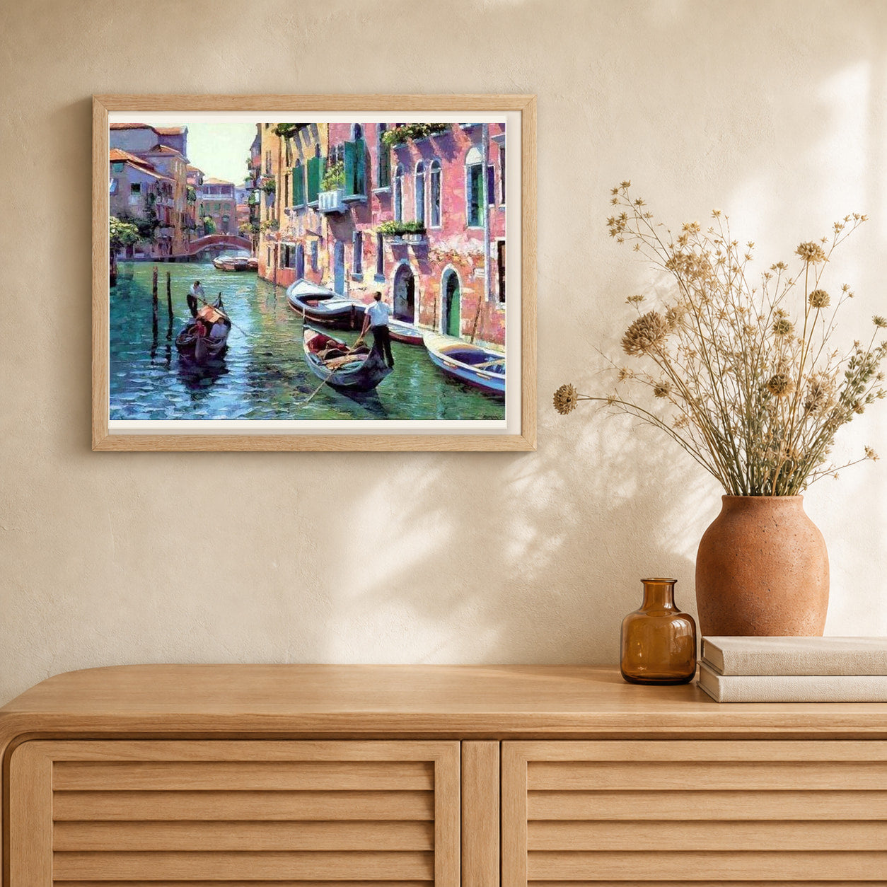Canals of Venice artwork displayed in a warm interior