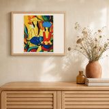 Women and Blue Cat artwork displayed in a warm interior