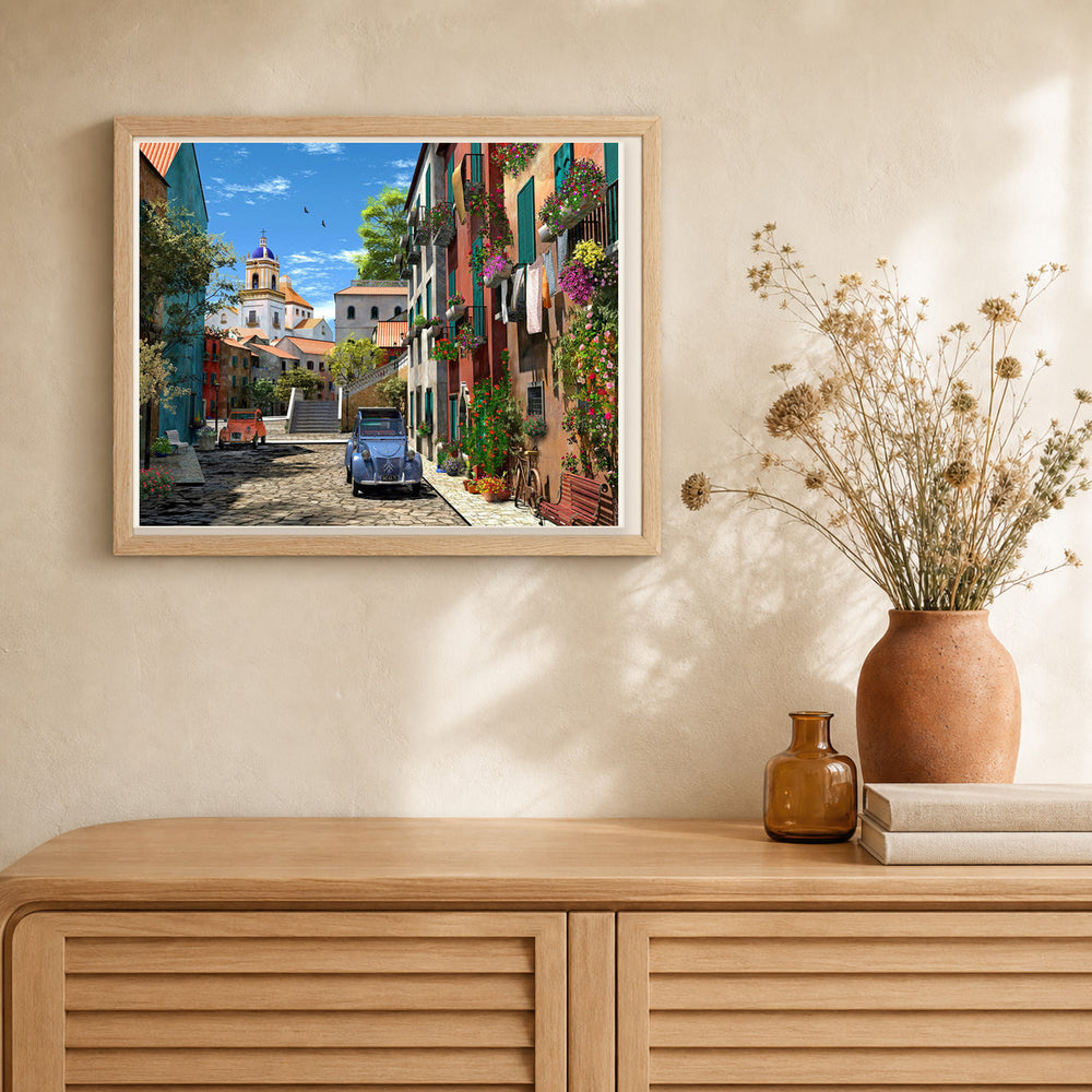 Alley and vintage car artwork displayed in a warm interior
