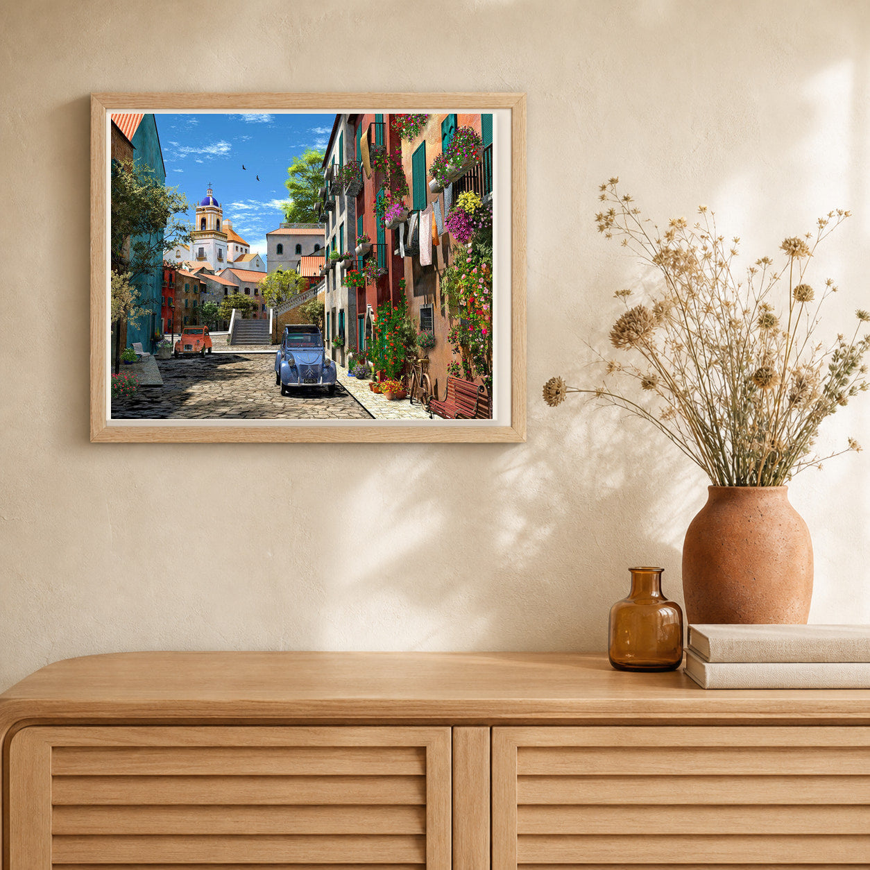 Alley and vintage car artwork displayed in a warm interior