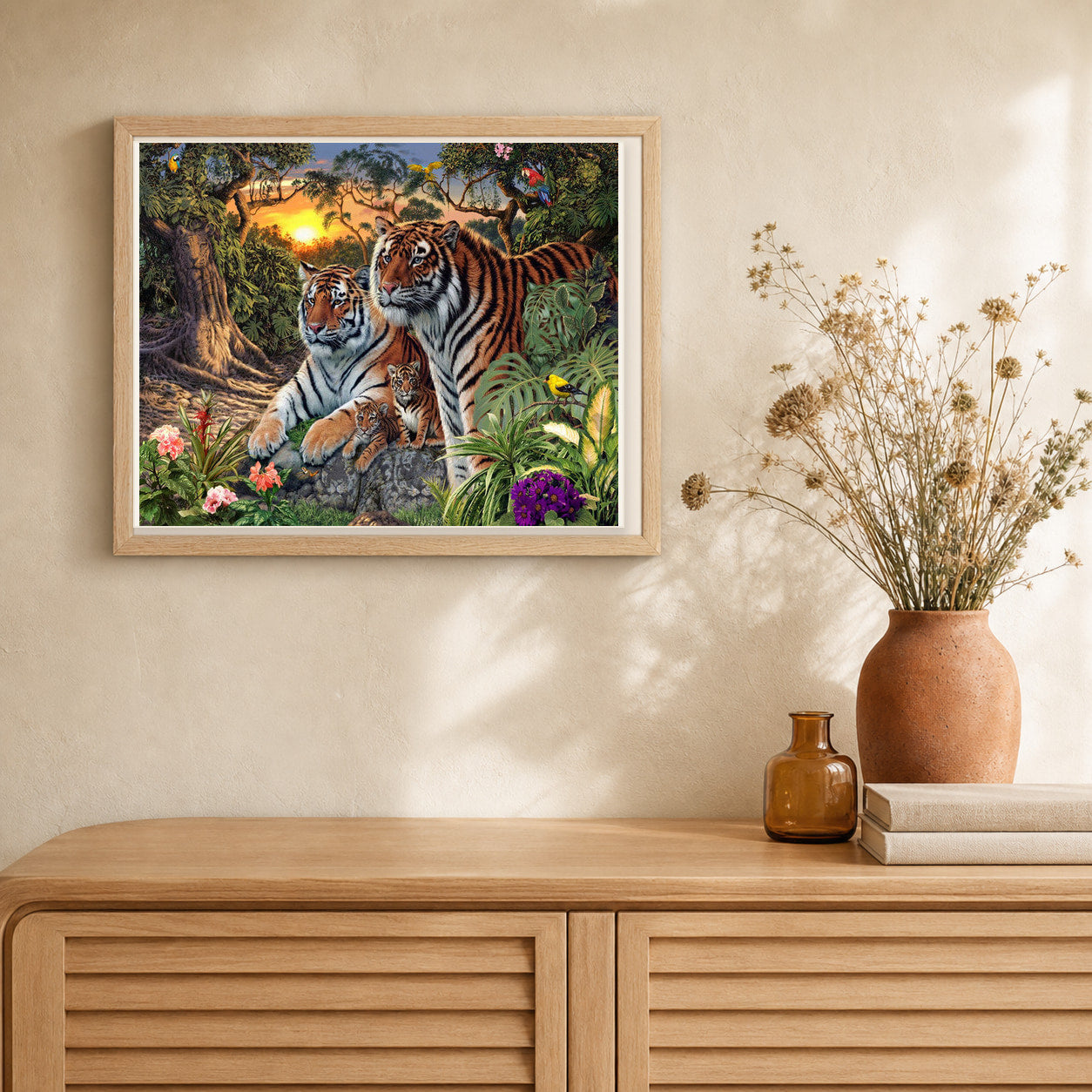 Tiger family artwork displayed in a warm interior