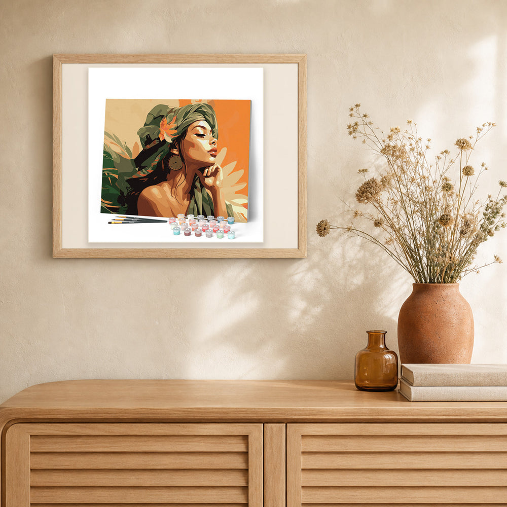 Woman in African Turban artwork displayed in a warm interior