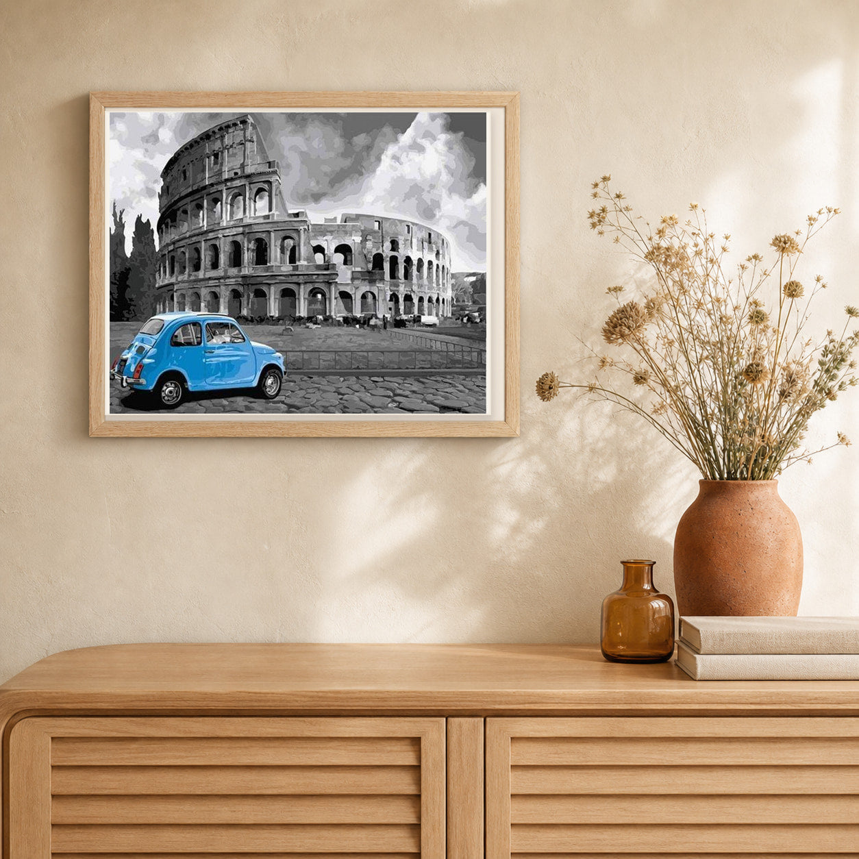 Blue Fiat and Coliseum artwork displayed in a warm interior