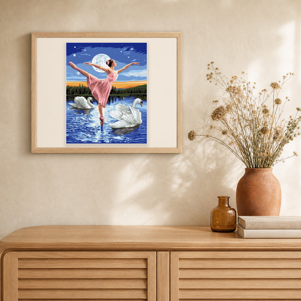 Swan Lake and Full Moon artwork displayed in a warm interior
