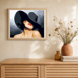 Woman Wearing a Black Hat artwork displayed in a warm interior
