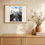 Coffee and Seagulls at waterfront artwork displayed in a warm interior