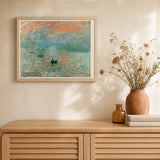 Monet Sunrise artwork displayed in a warm interior