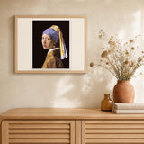 Vermeer Girl with the Pearl artwork displayed in a warm interior