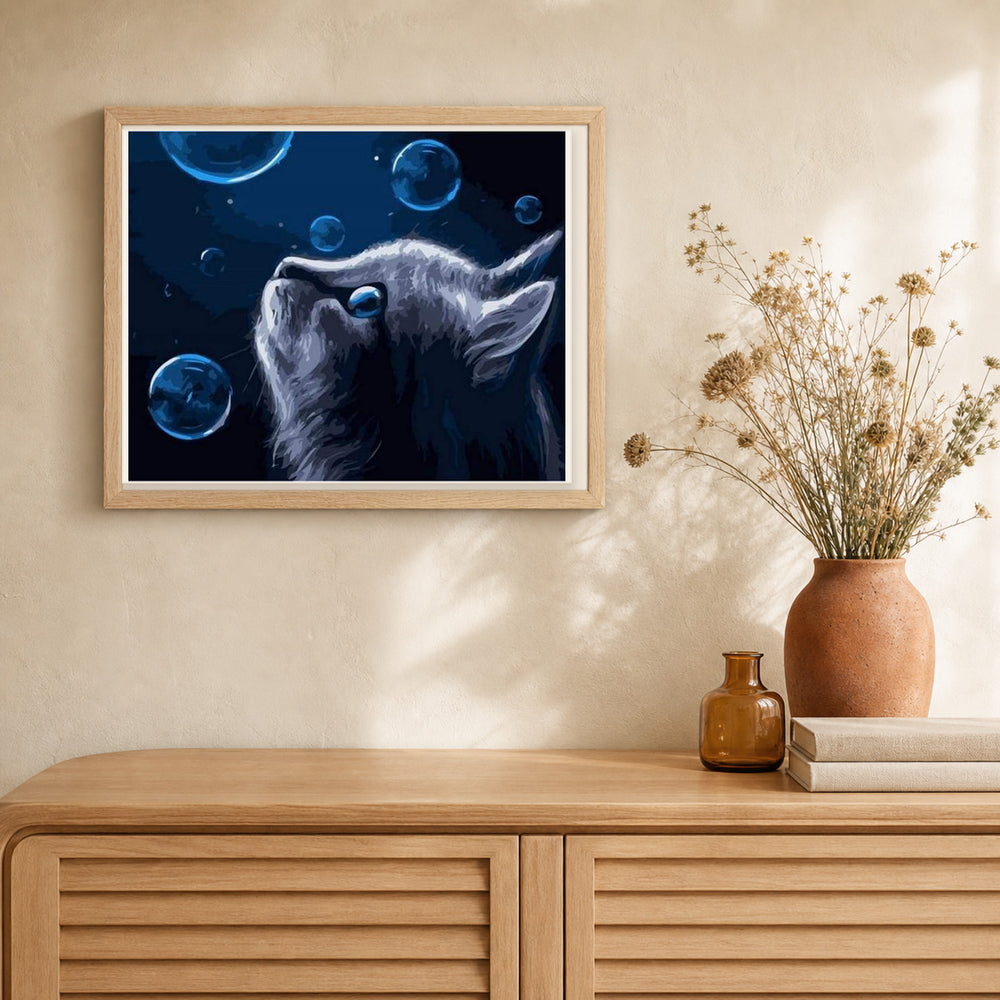 Blue Cat and Bubbles artwork displayed in a warm interior