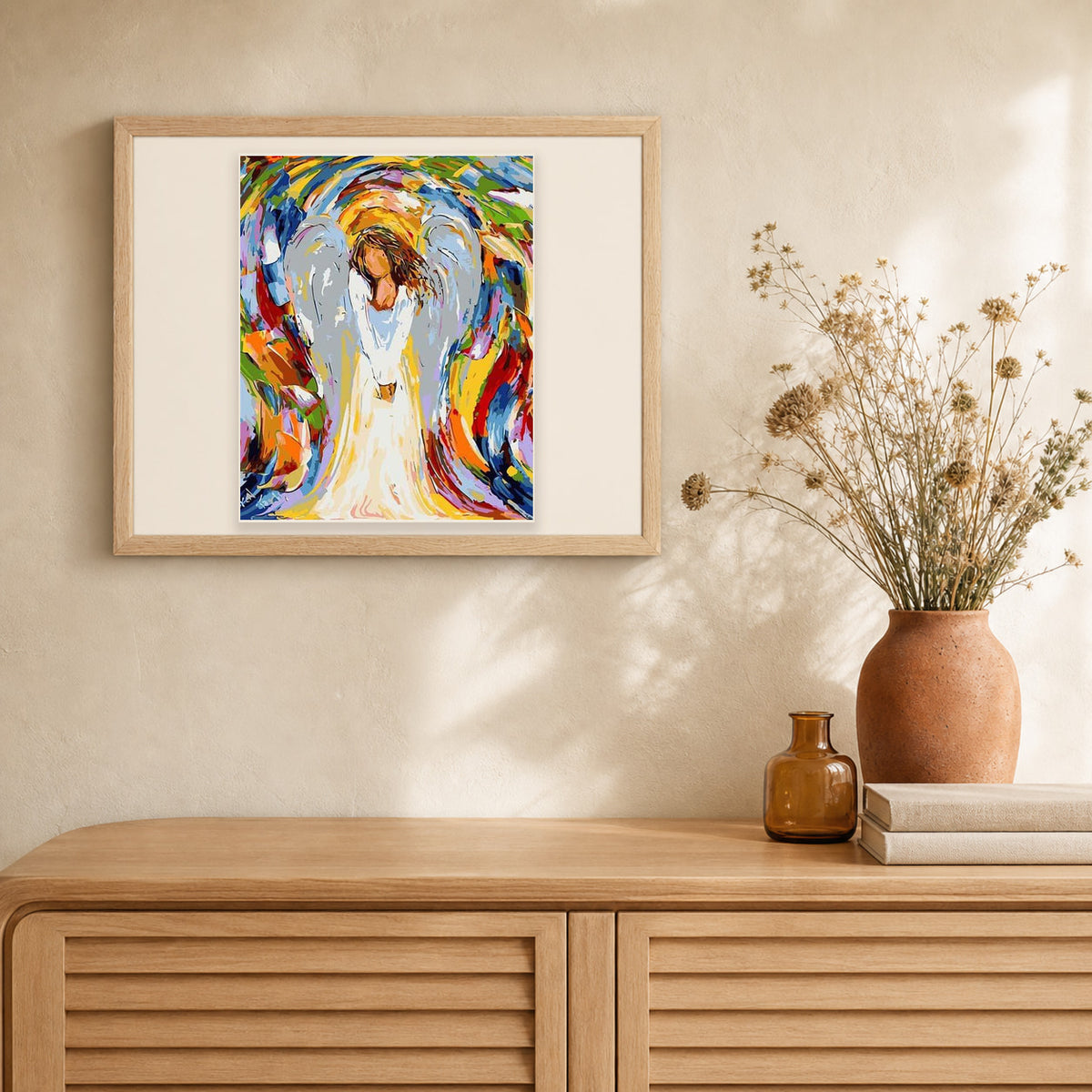 Abstract Little Angel artwork displayed in a warm interior