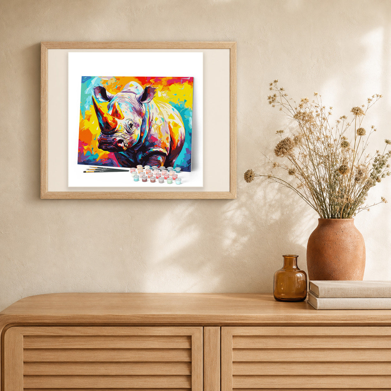 Colorful Abstract Rhinoceros artwork displayed in a warm interior