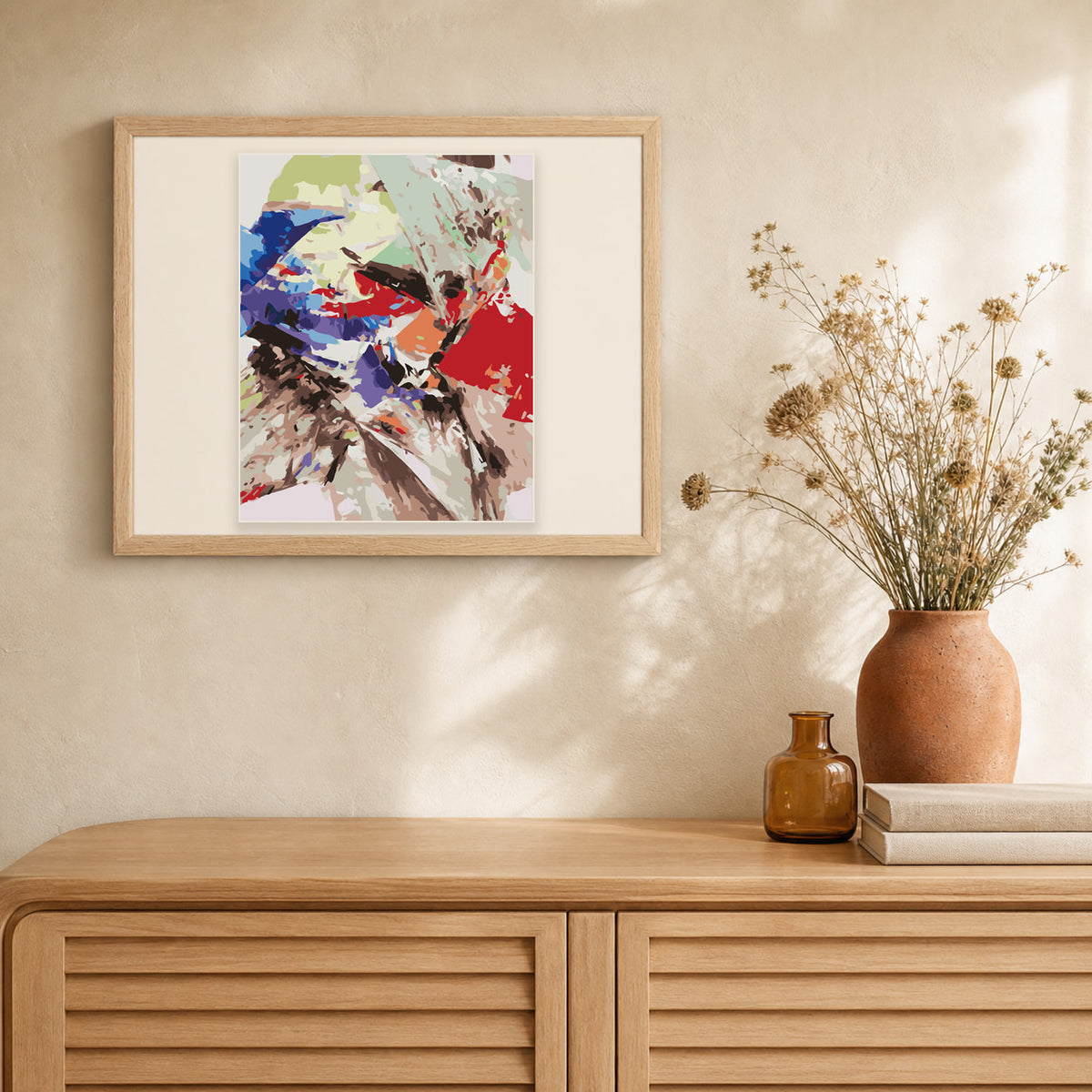 Colored abstract artwork displayed in a warm interior
