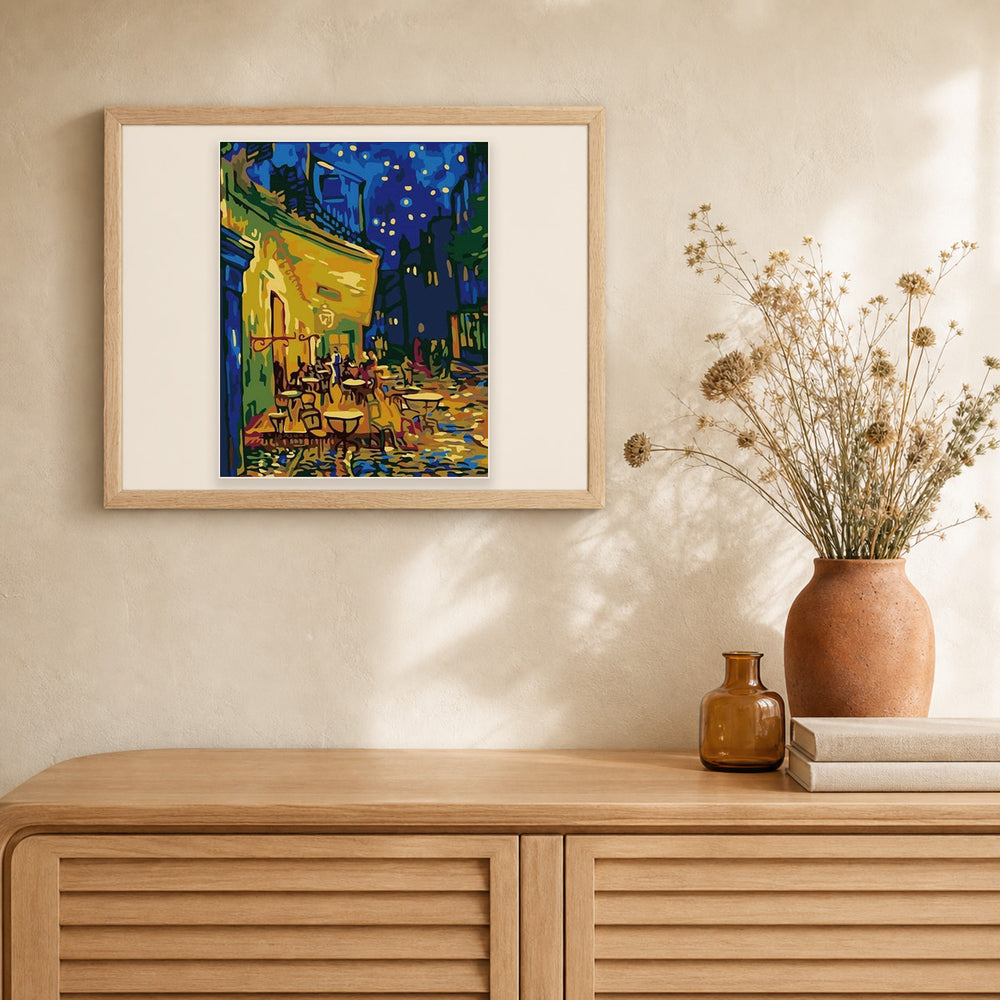 Van Gogh Café Terrace at Night artwork displayed in a warm interior