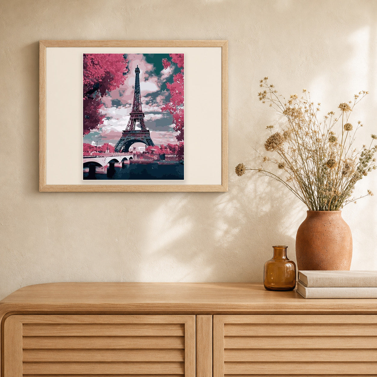 Eiffel Tower in Spring Pink Colors artwork displayed in a warm interior