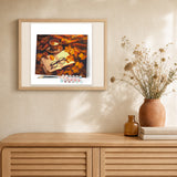 Fall Tea and Book artwork displayed in a warm interior