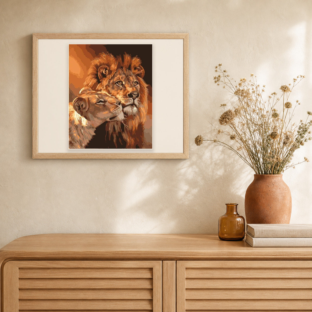 Lion and Lioness Couple artwork displayed in a warm interior