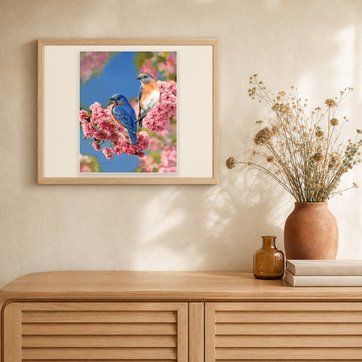 Bluebirds artwork displayed in a warm interior
