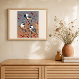 Birds and Fruit Tree artwork displayed in a warm interior