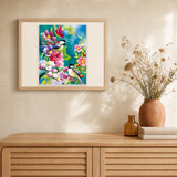 Small Birds in Spring artwork displayed in a warm interior