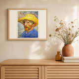 Van Gogh Self-Portrait with Straw Hat artwork displayed in a warm interior