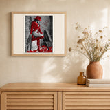 Woman with Red Leather boots artwork displayed in a warm interior