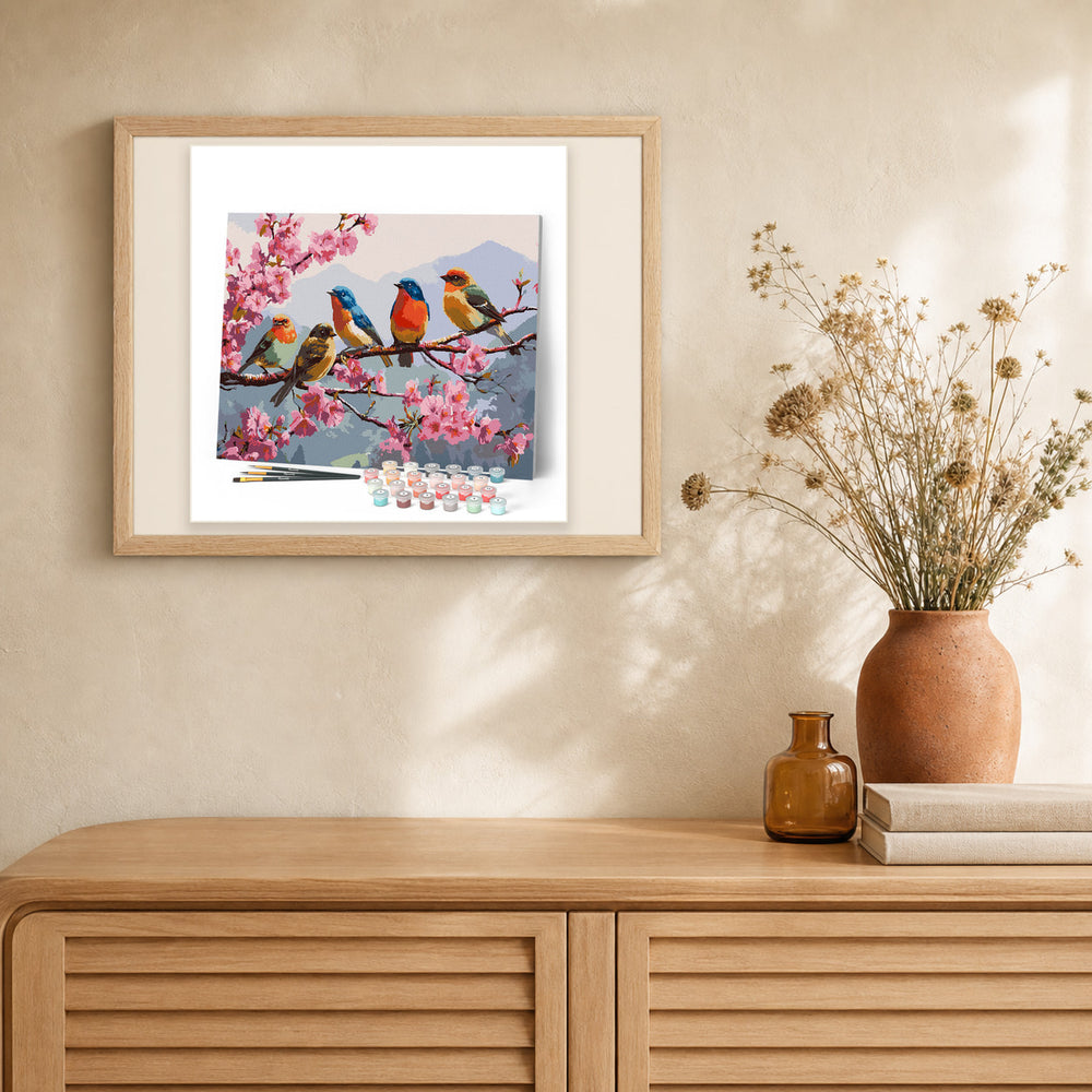 The Band of Songbirds artwork displayed in a warm interior