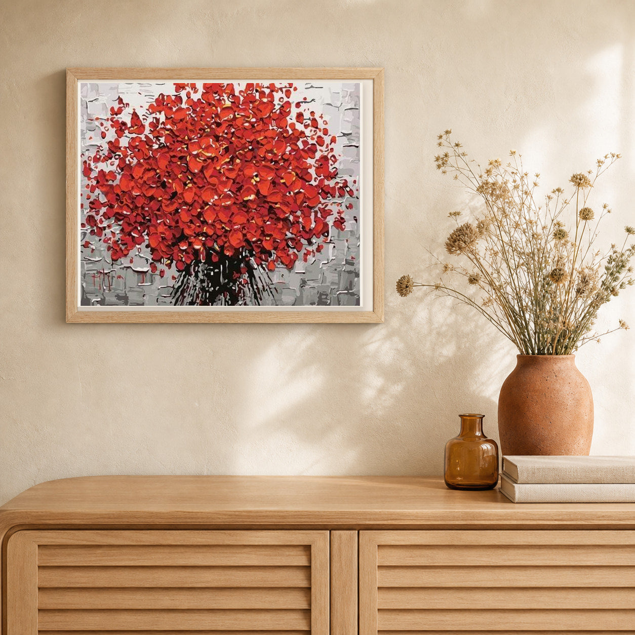 Abstract Red Flowers artwork displayed in a warm interior