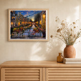 View of an Amsterdam Canal artwork displayed in a warm interior