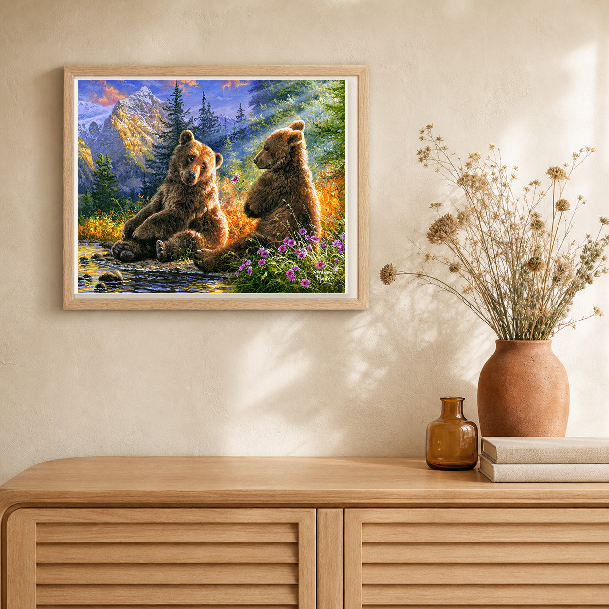 Sitting Bears artwork displayed in a warm interior