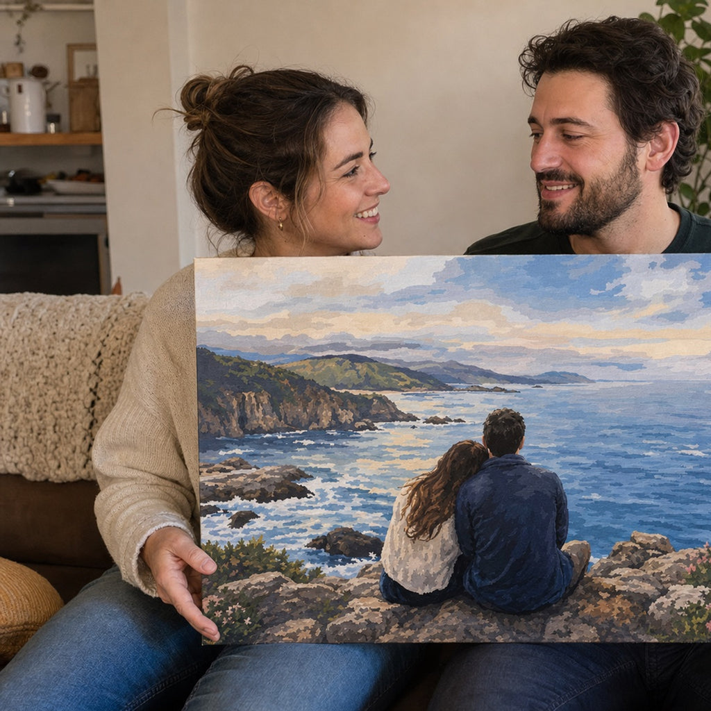 A couple holding a finished painting of a shared memory