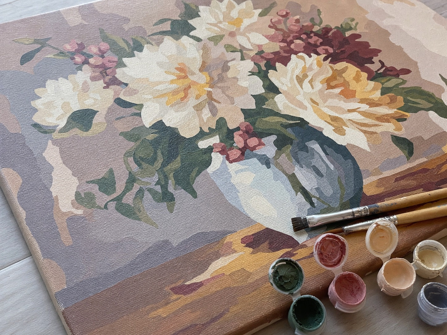 Close view of finished paint by numbers color blocks and canvas texture